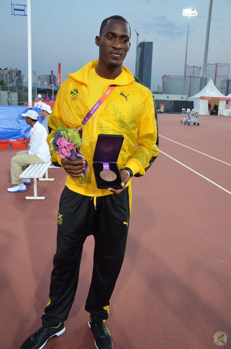 Hansel Parchment displays his bronze medal